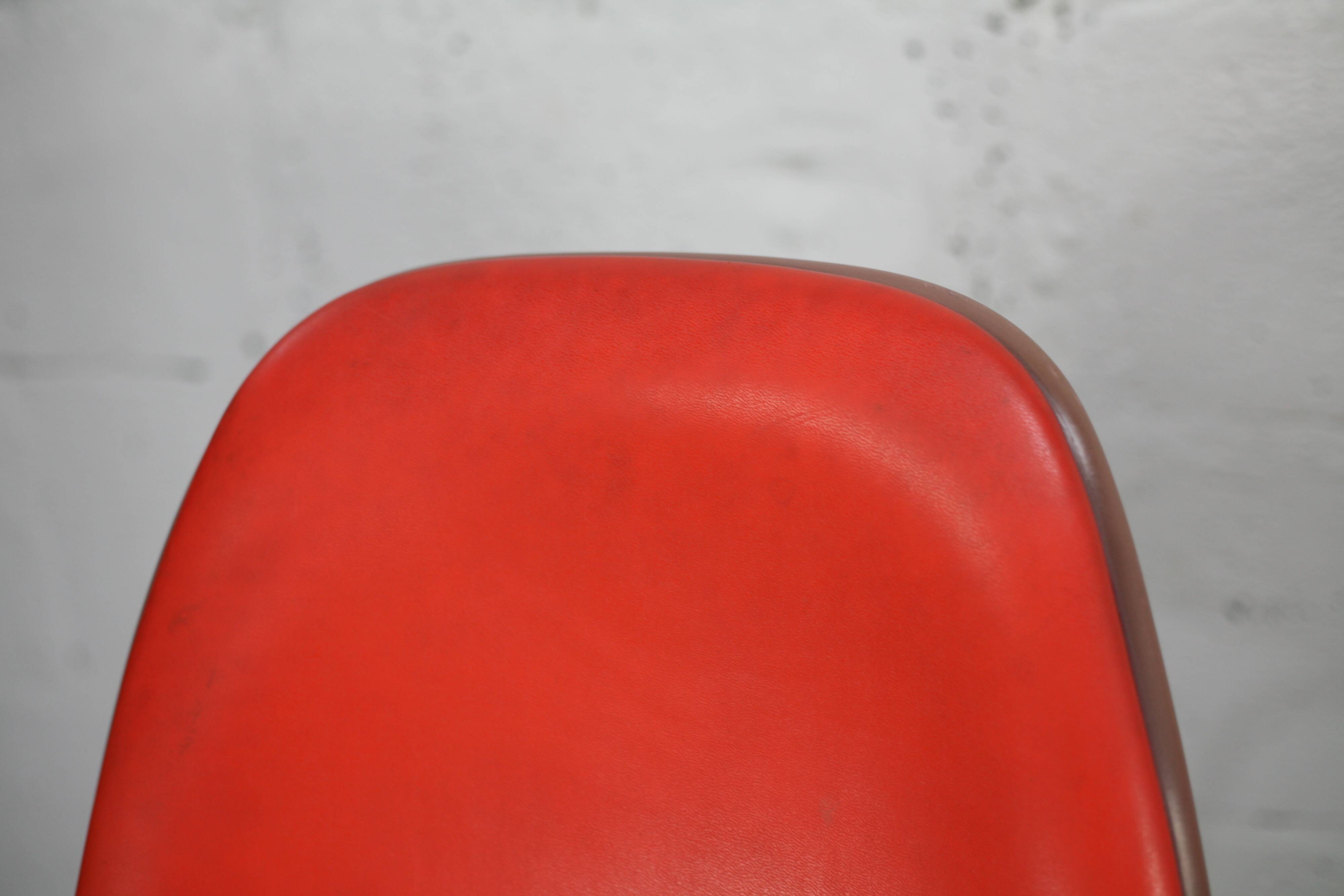 Ray & Charles Eames, Herman Miller edition, set of 4 orange chairs. Circa 1960