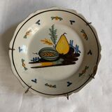 Plate of Nevers in earthenware late eighteenth century decoration with pear