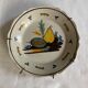 Assiette de Nevers en faïence fin XVIIIe siècle décor à la Poire