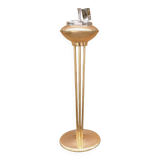 Old brass and chrome-plated metal ashtray on stand