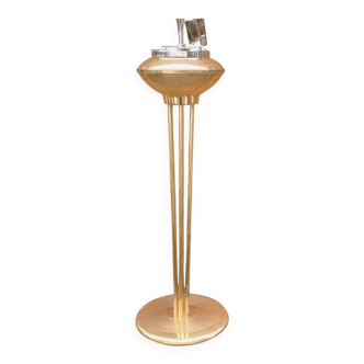 Old brass and chrome-plated metal ashtray on stand