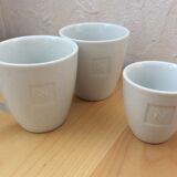 2 coffee cups and saucers