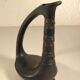 Zoomorphic pitcher vase in black ceramic