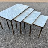 Pull-out table in marble and brass