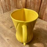 Vintage lemon yellow ceramic pitcher.