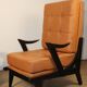 Paire de fauteuils vintage années 50 en bois noir et cuir caramel