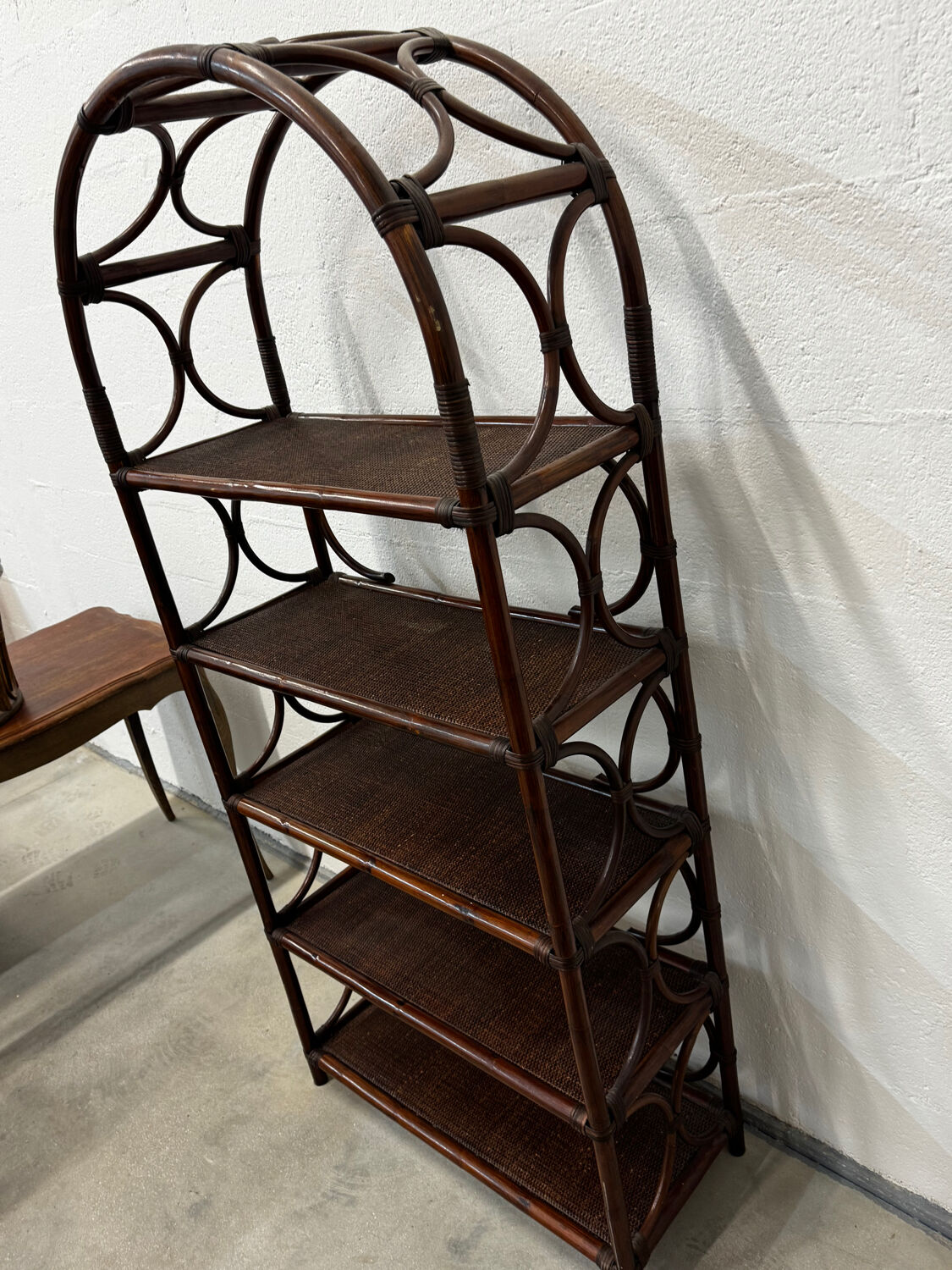 Dark rattan and bamboo bookshelf shelf