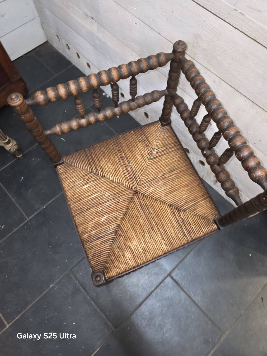 Antique corner fireplace armchair