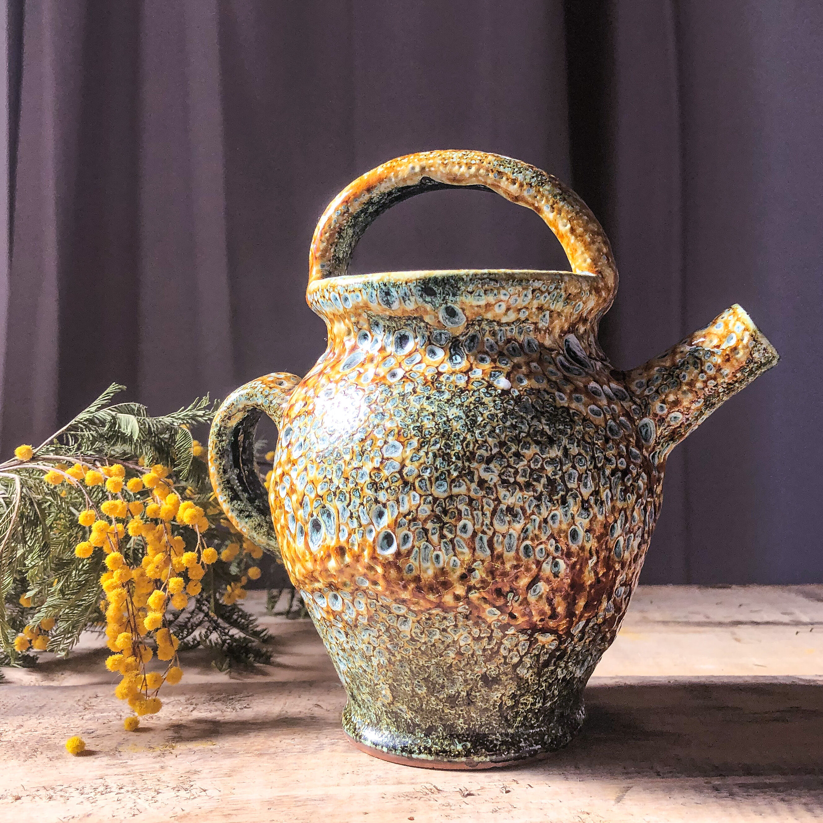 Enamelled terracotta pitcher