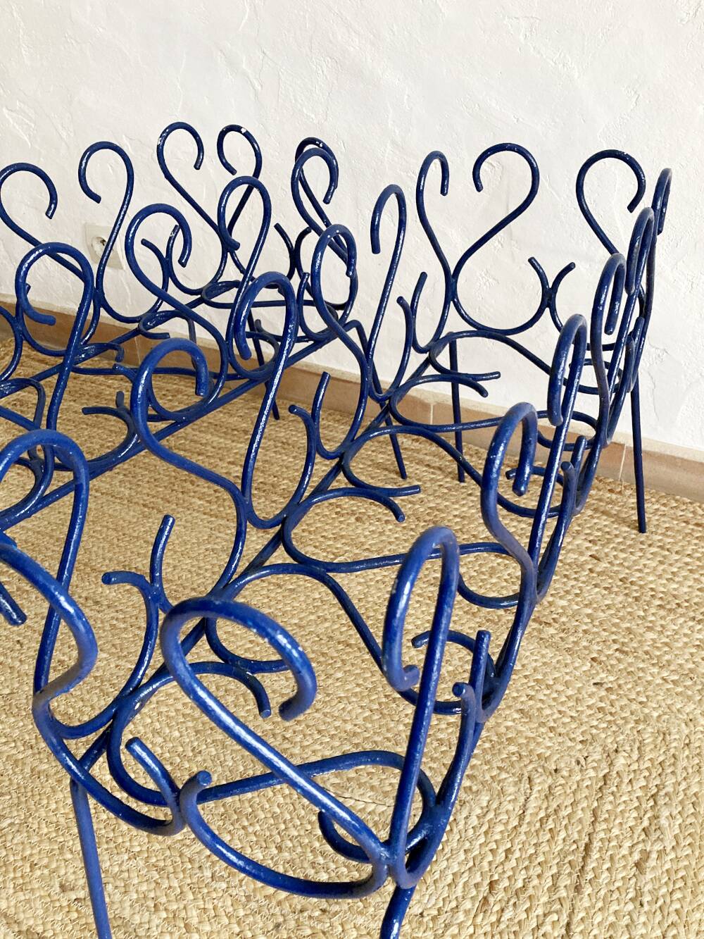 Pair of blue-painted wrought iron planters, 1960s