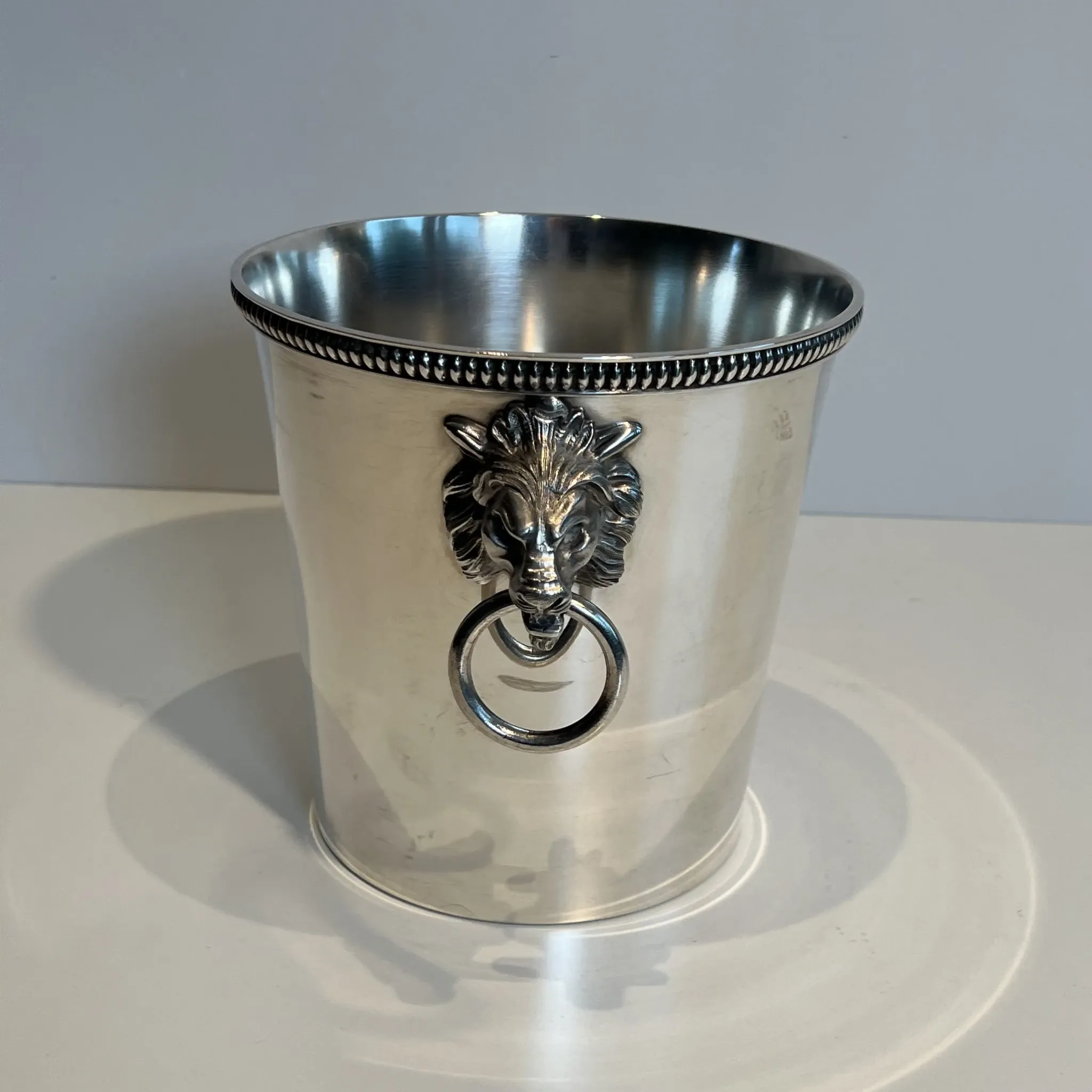 Silver-plated champagne bucket Orfèvrerie Saint-Médard. Handles in the shape of heads.
