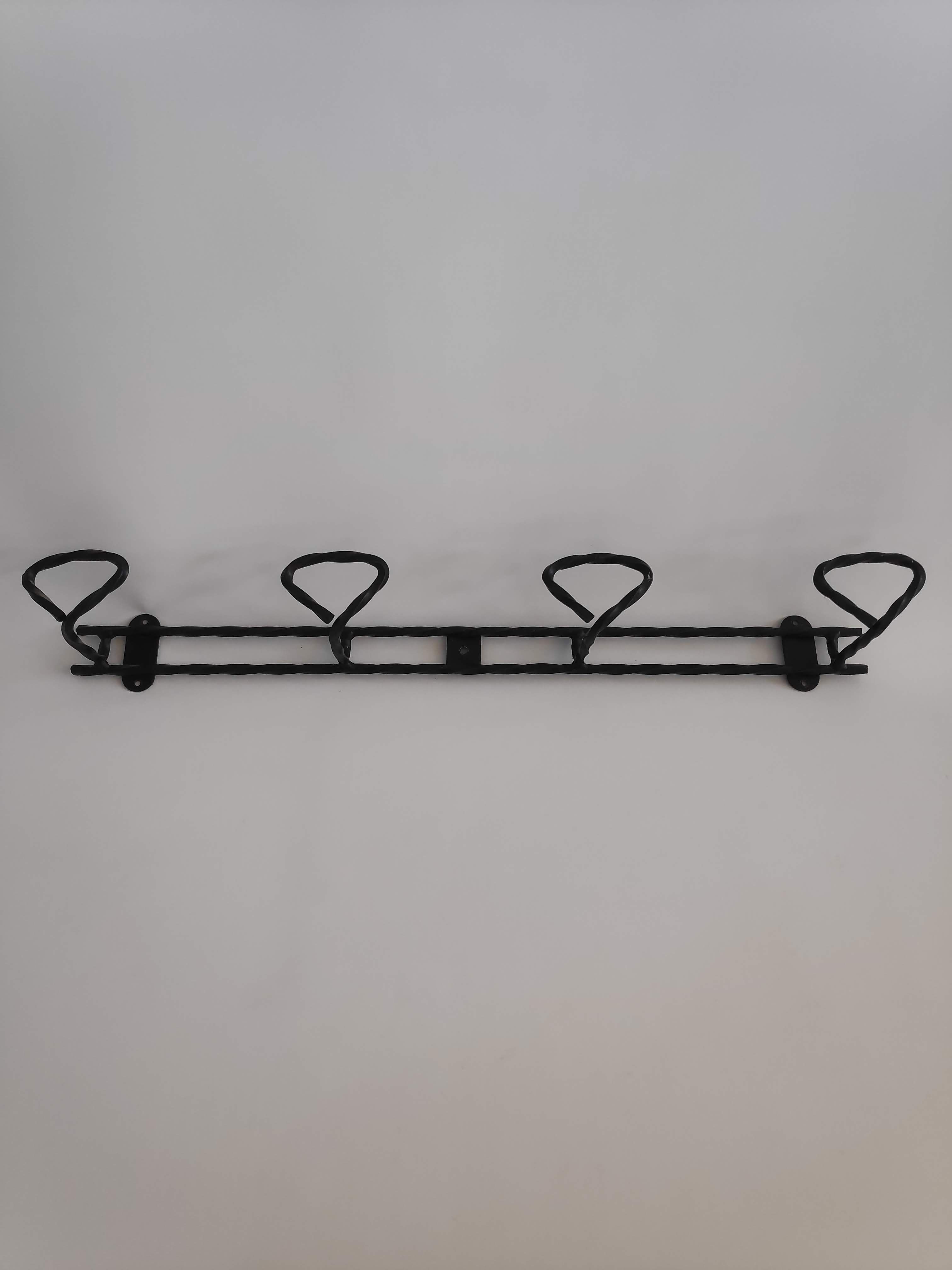 Wall door with 4 twisted metal pads from the 1950s