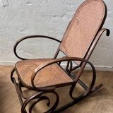 Curved wooden rocking chair
