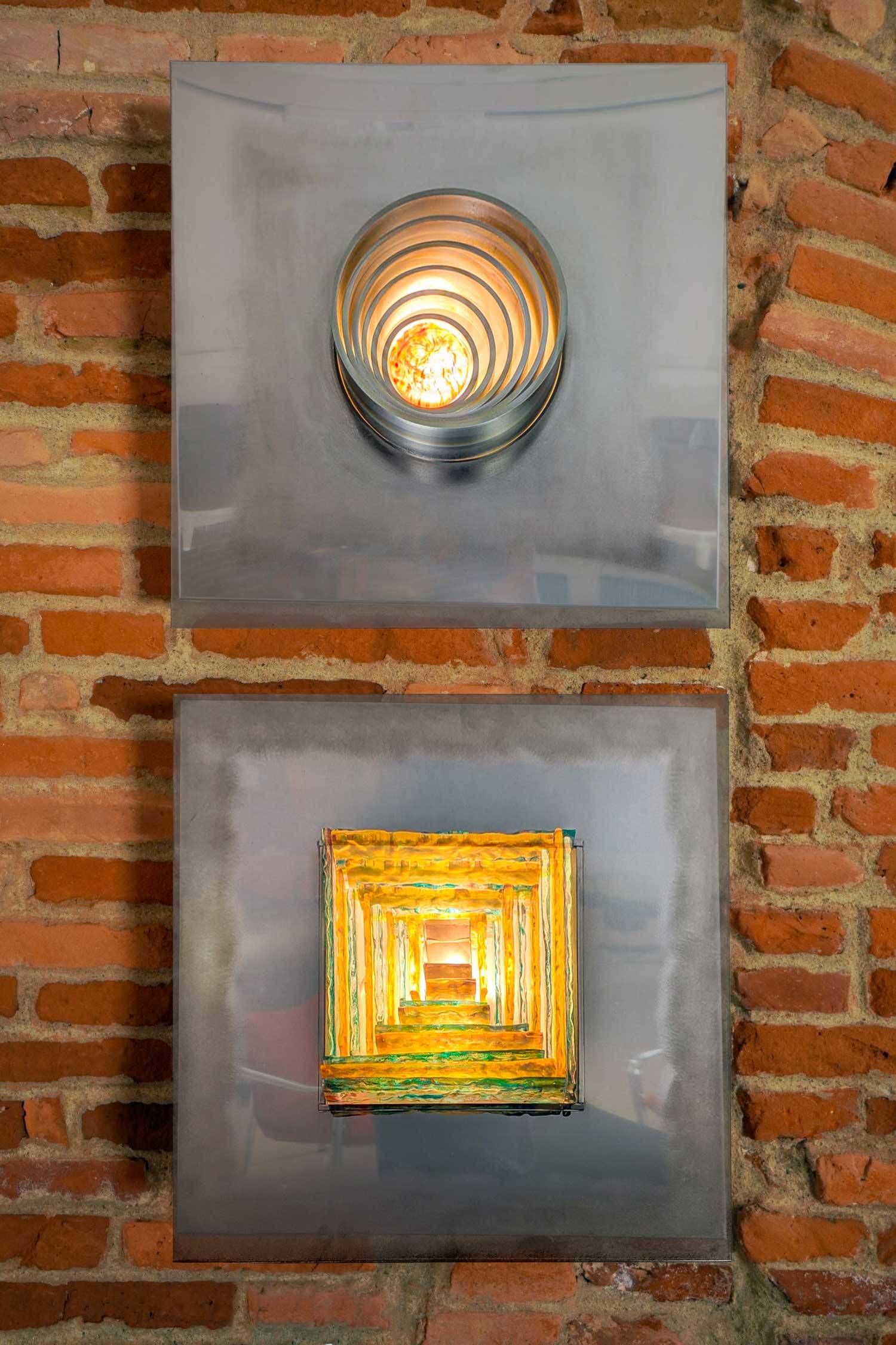 Pair of metal, resin and glass wall lights by Angelo Brotto, circa 1970