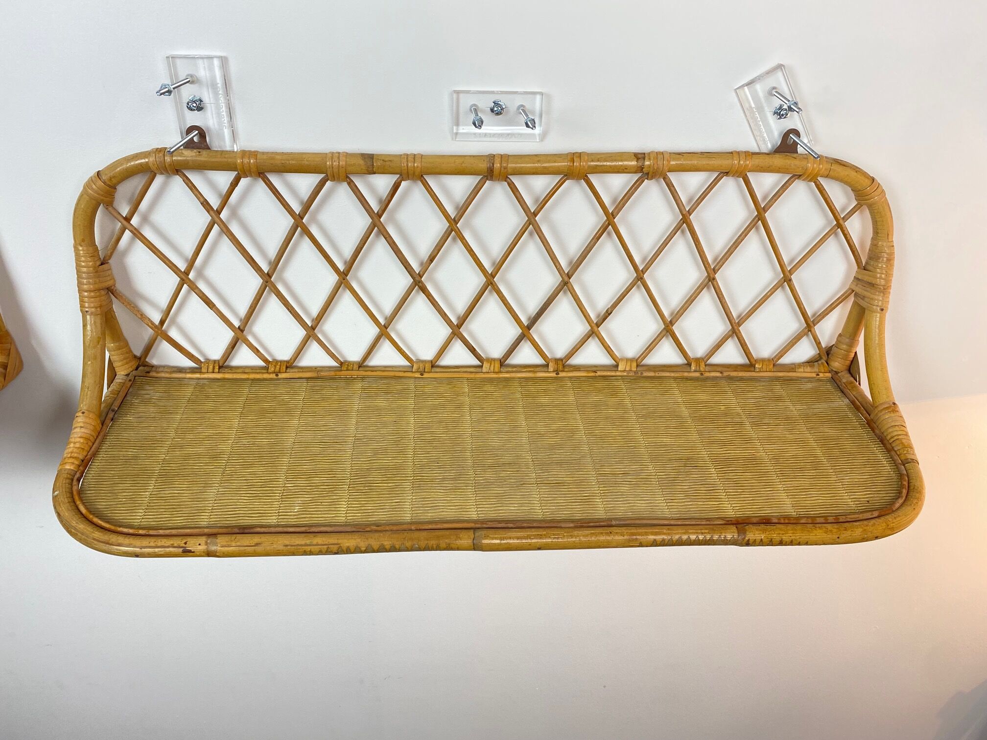 Pair of vintage rattan wall shelves 70s