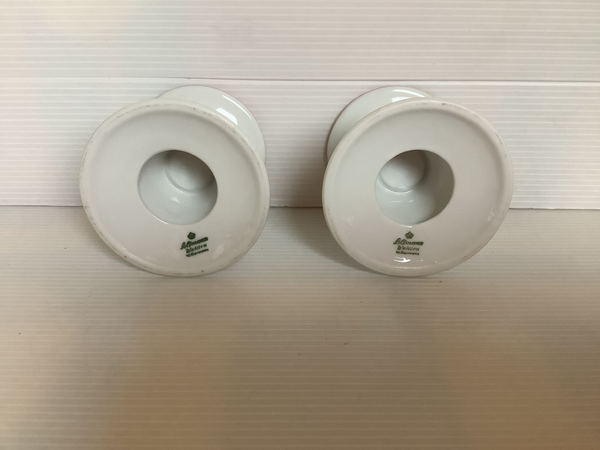 Pair of white candlesticks, pink line, Germany