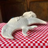 Large white ceramic fish to place.