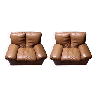 Pair of 70s leather armchairs