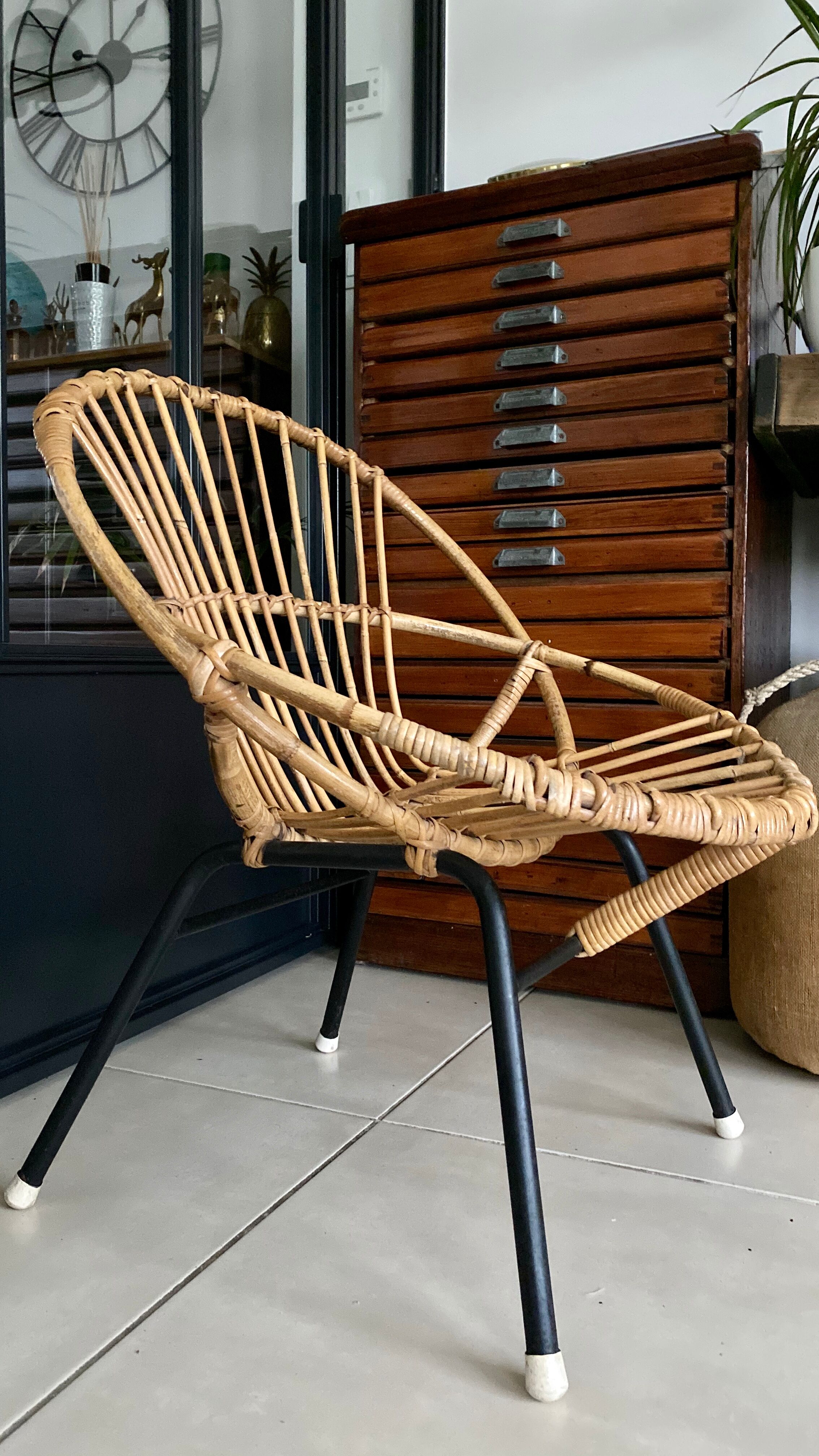 Old vintage metal foot rattan chair
