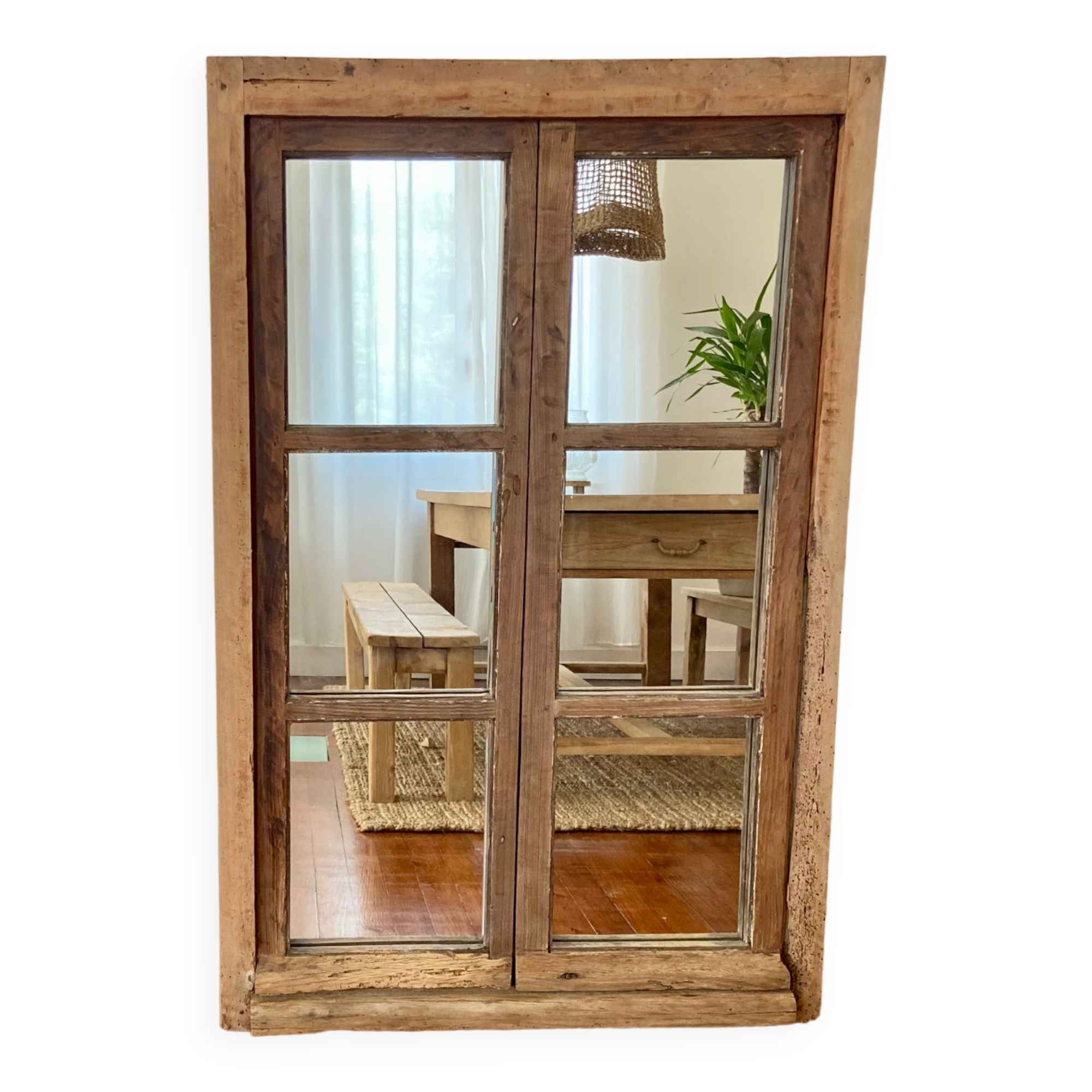 Mirror in old rustic window