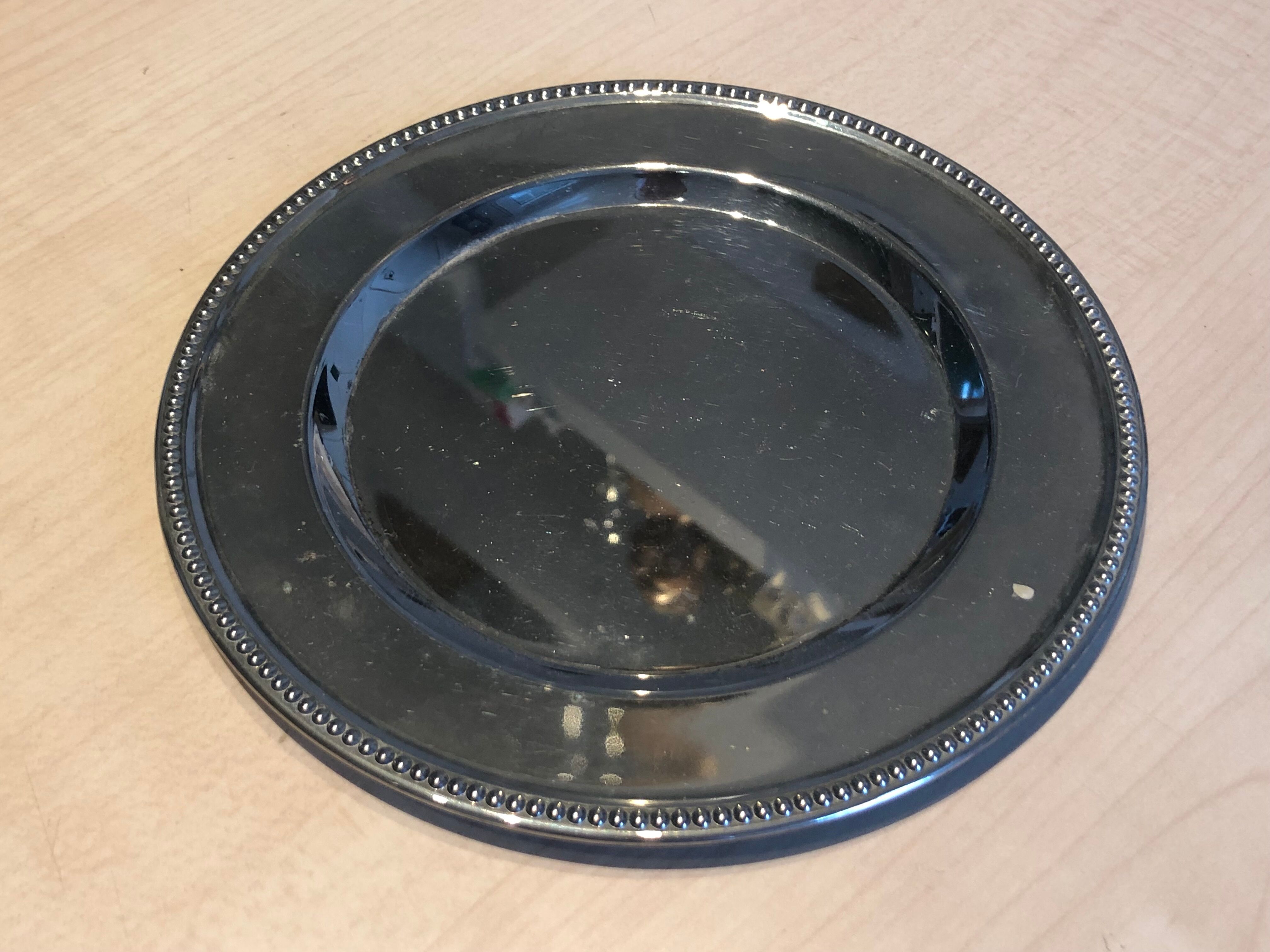 Silver metal bottle bottom