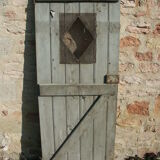 Porte ancienne provenant d'un four a pain