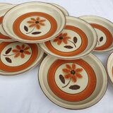 Set 11 plates 1970 Revernay Sarreguemines orange and brown on sandstone background