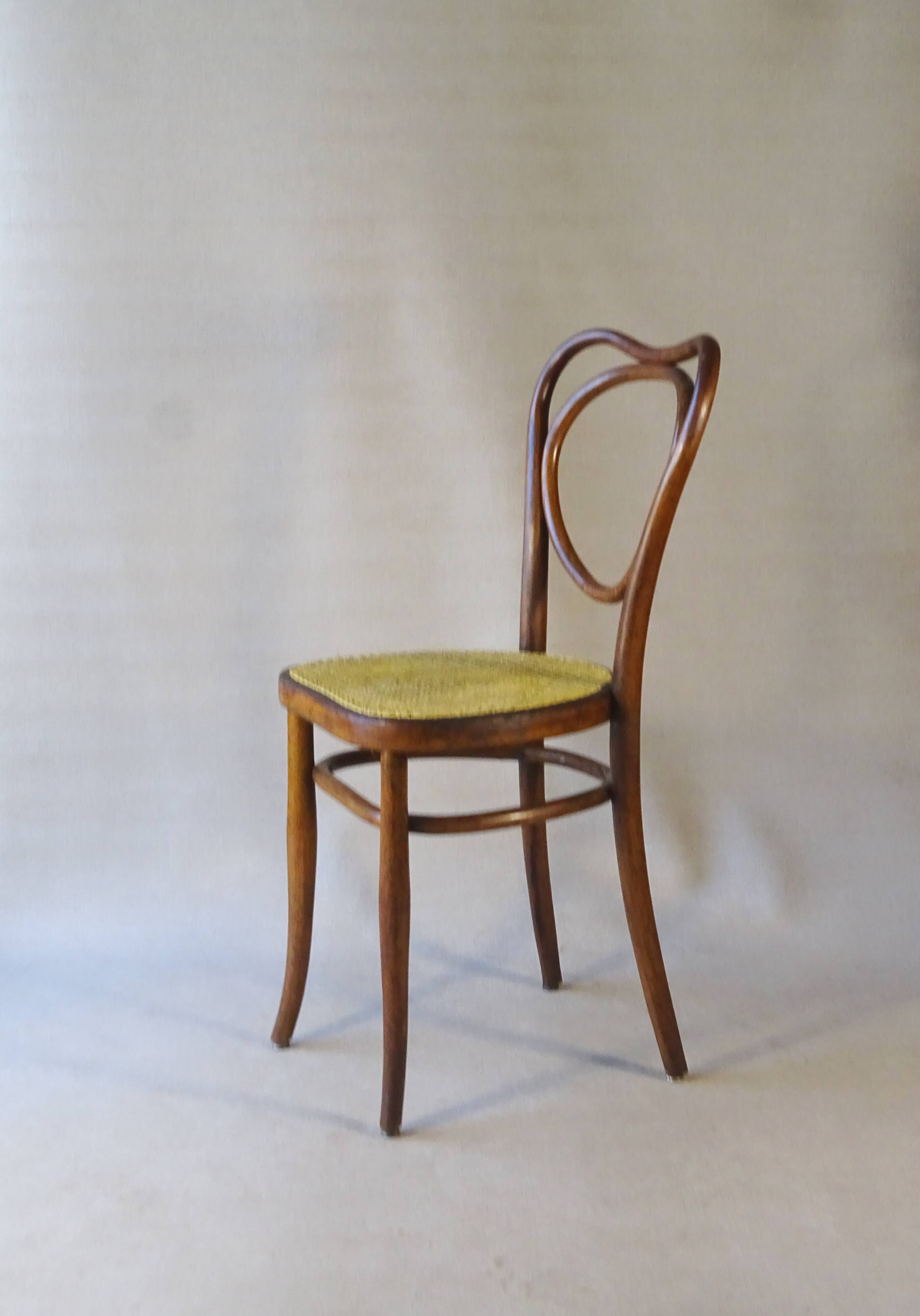 Fake pair of caned bistro chairs, Kohn and Mundus, circa 1910 - no Thonet.