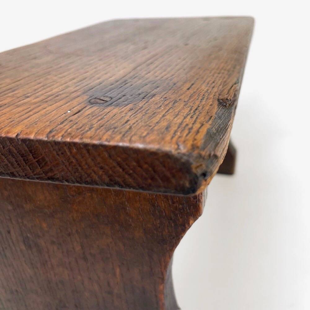 Small old wooden bench or footstool