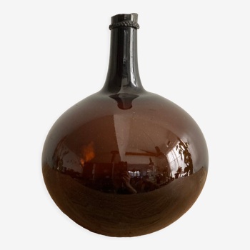 Old amber demijohn