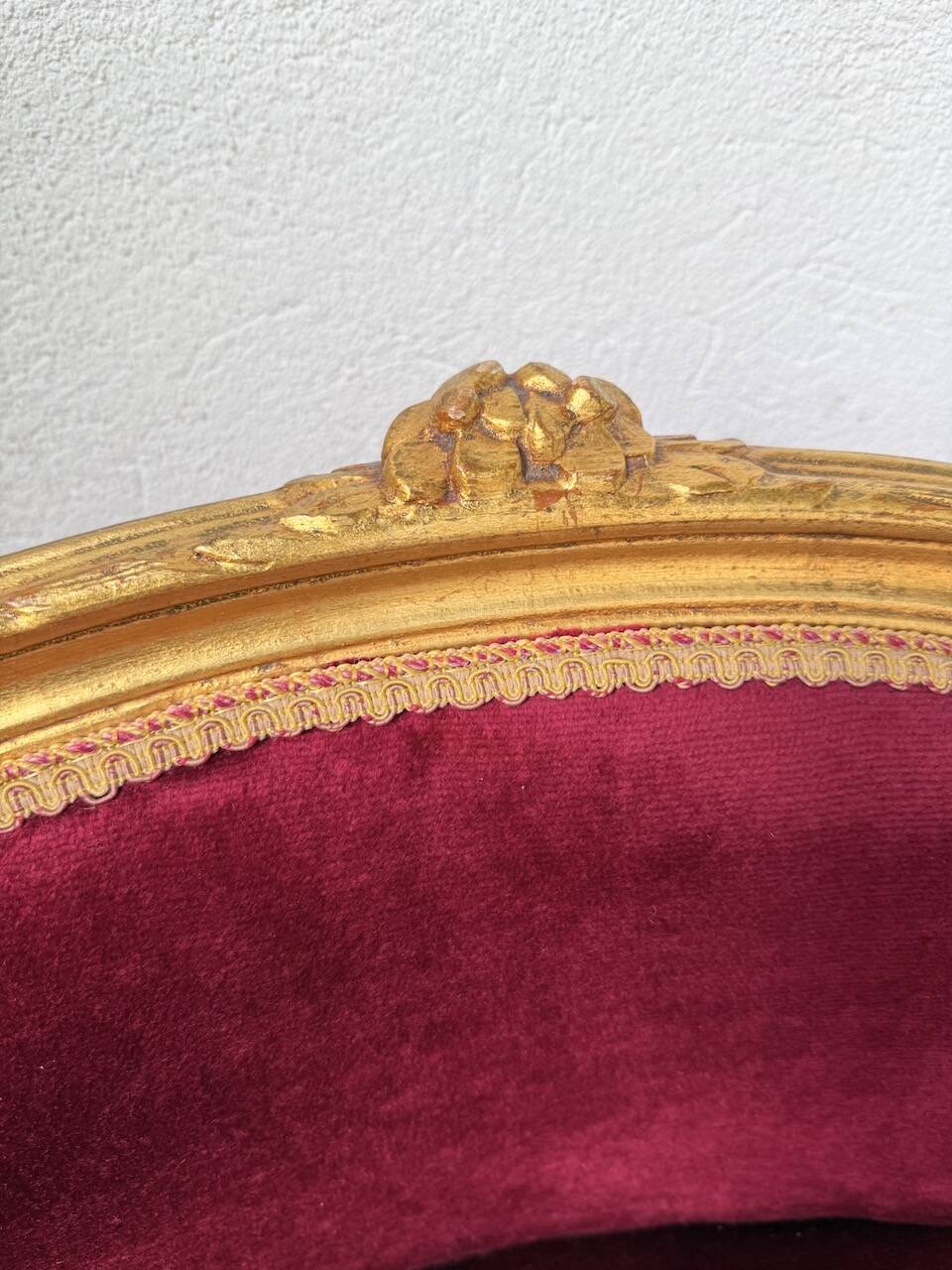Louis XVI gilt wood and red velvet armchair