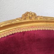 Louis XVI gilt wood and red velvet armchair