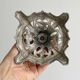 Candle holder with sculpted metal base, antique.