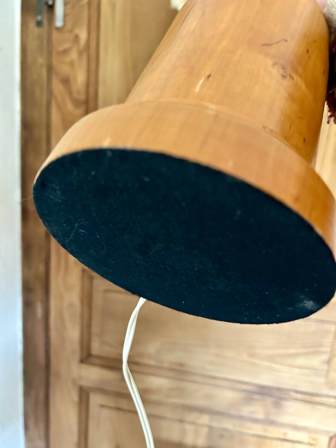 Turned wood base lamp with spun lampshade