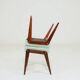 Vintage children's chair stool in pistachio green, mid-century modern design.