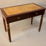 Bureau plat en acajou xixème dessus cuir