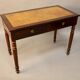 Bureau plat en acajou xixème dessus cuir