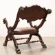 Antique neo-Renaissance chair in wood and leather, 20th century