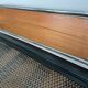 Pair of teak and chrome beds with mattress