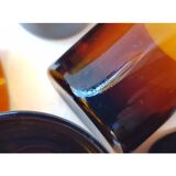 11 amber-coloured glasses