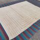 Handwoven natural wool rug size 200/300 cm