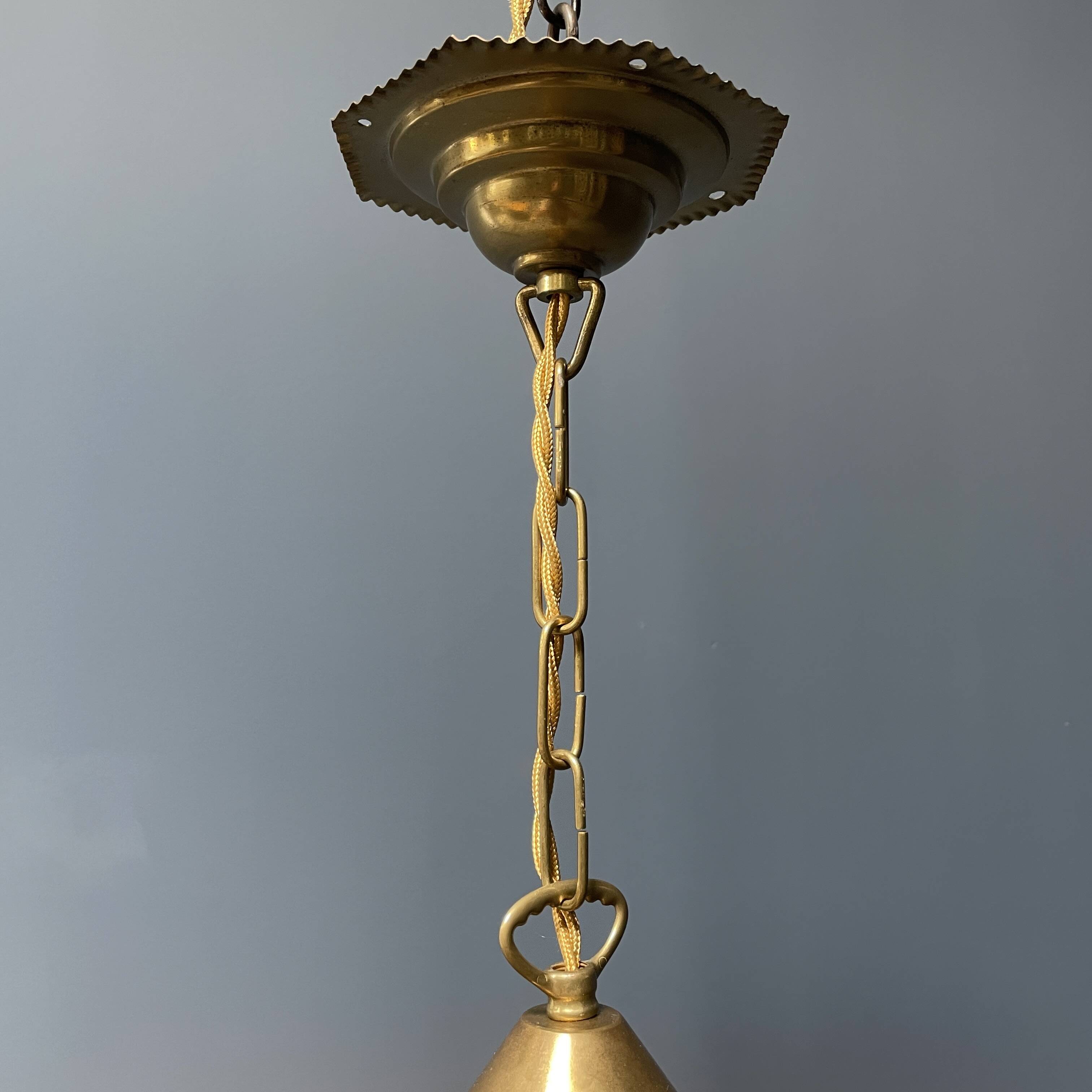 Brass lantern pendant lamp with yellow glass