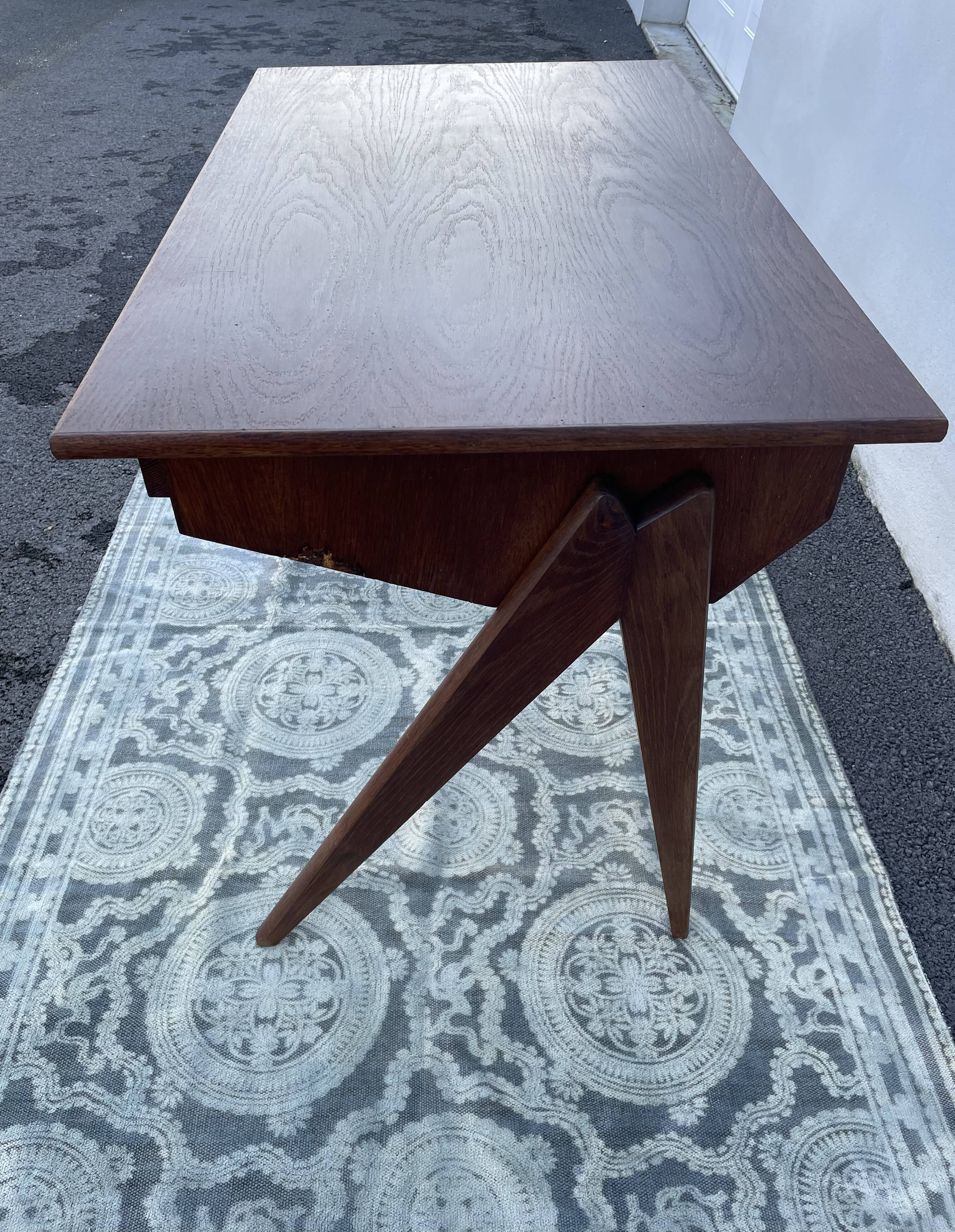 Modernist wooden desk with compass feet 1950