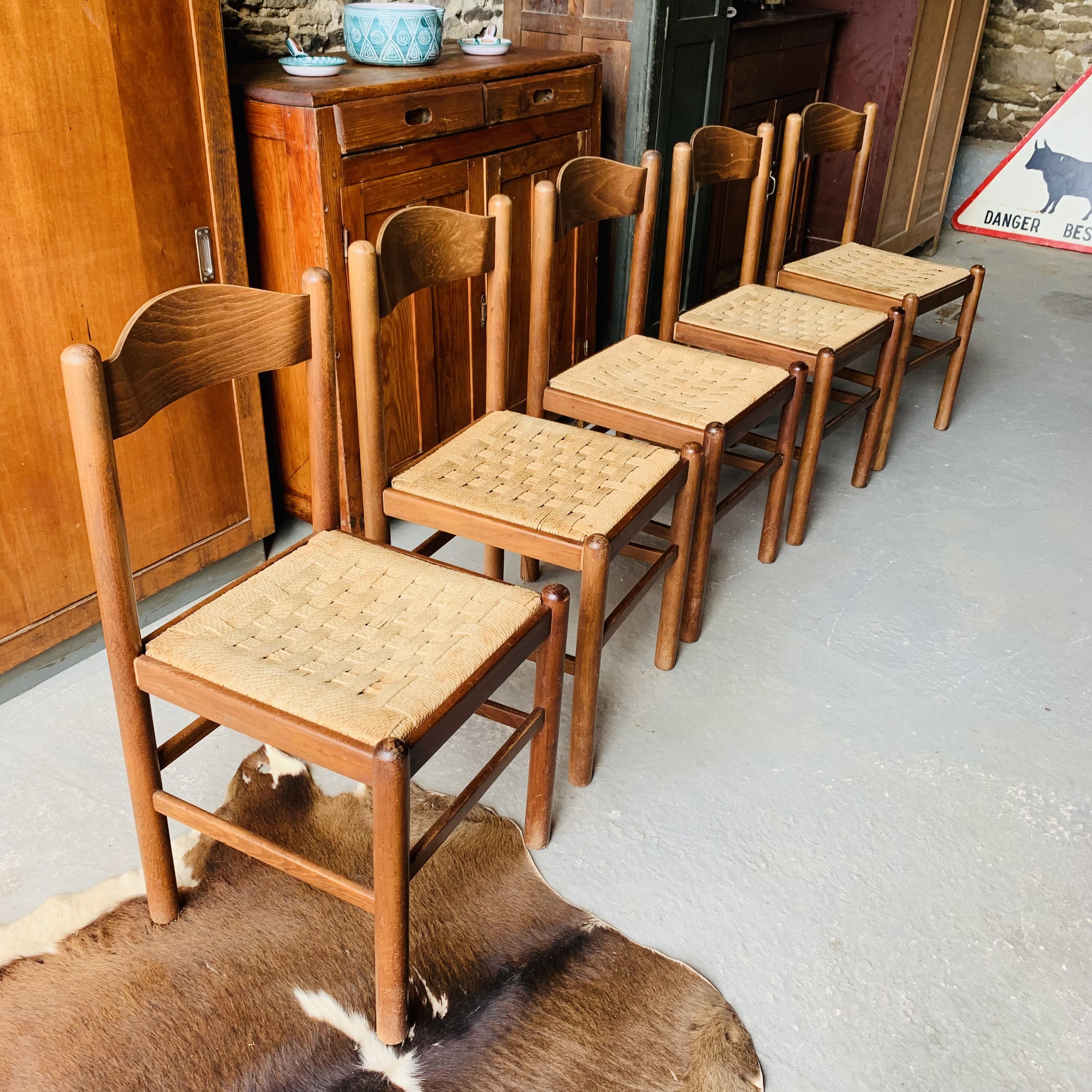 5 chairs made of wood and rope