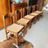 5 chairs made of wood and rope