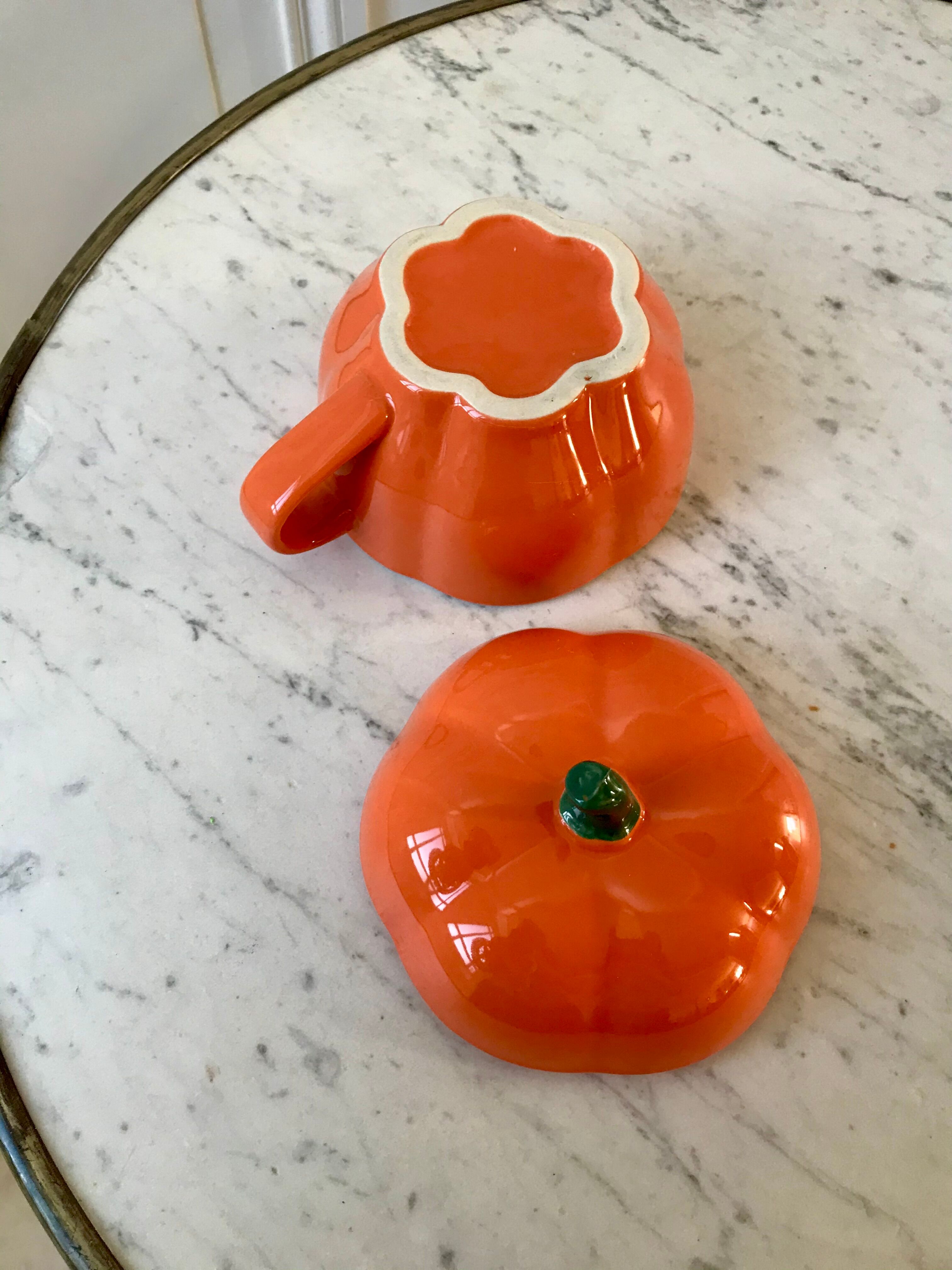 Orange lunch cup in the shape of squash 70s