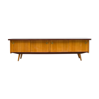 1950s low sideboard in ash, black formica surface. Professionally restored