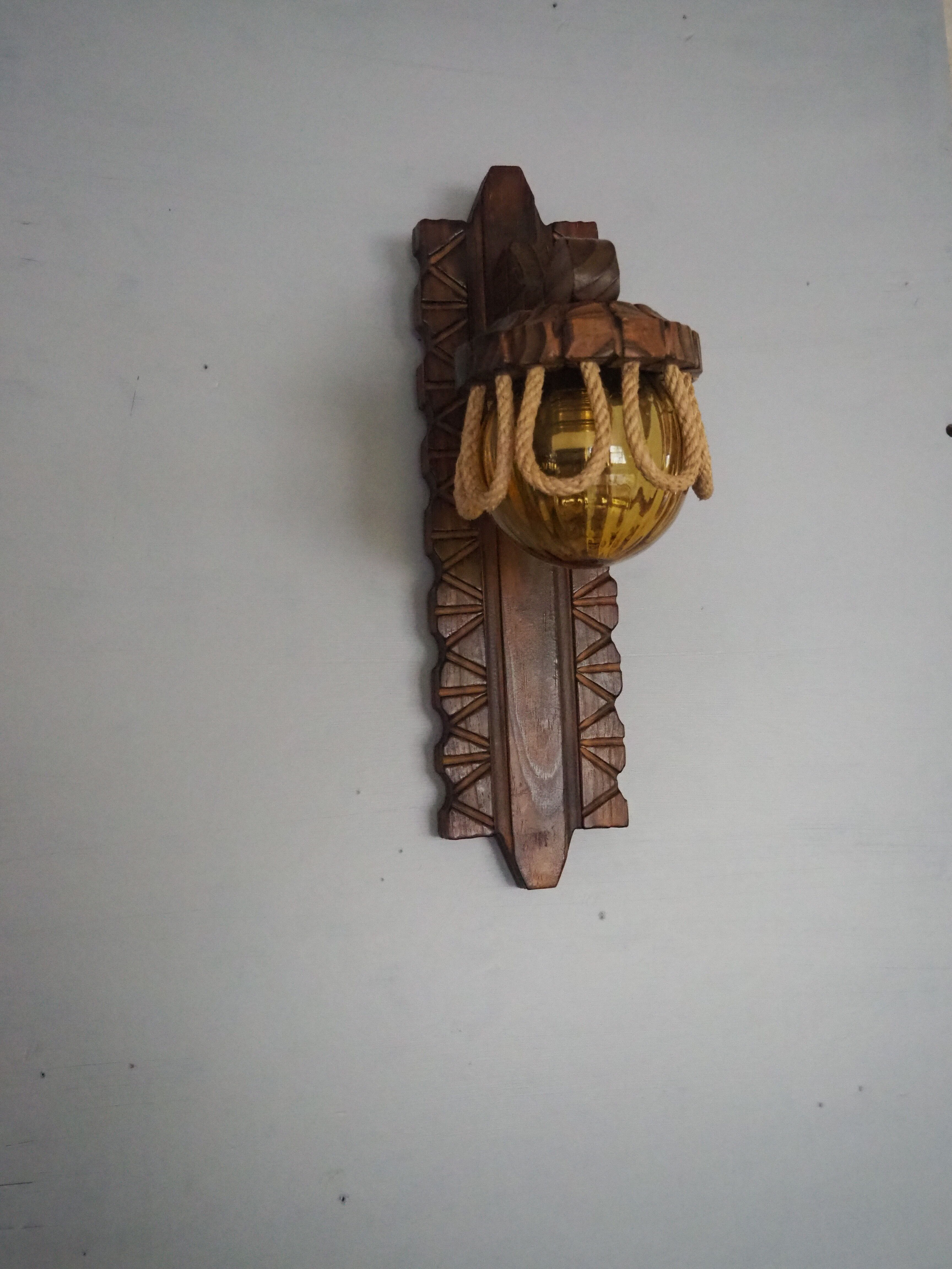 Sconce in wood and yellow glass ball from the 1960/1970