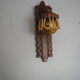 Sconce in wood and yellow glass ball from the 1960/1970