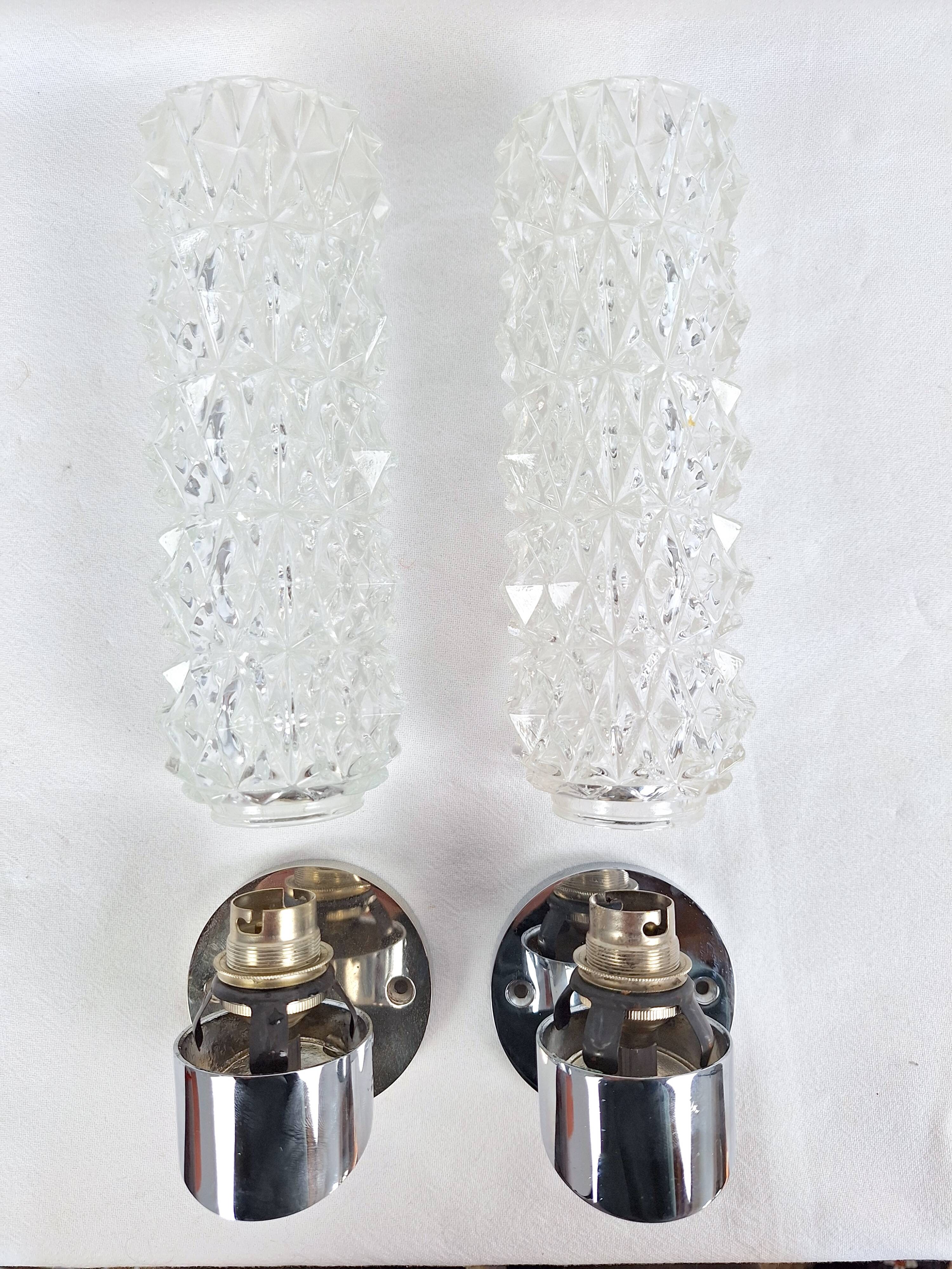 Pair of vintage space age chrome and molded glass wall lights, bedside night light